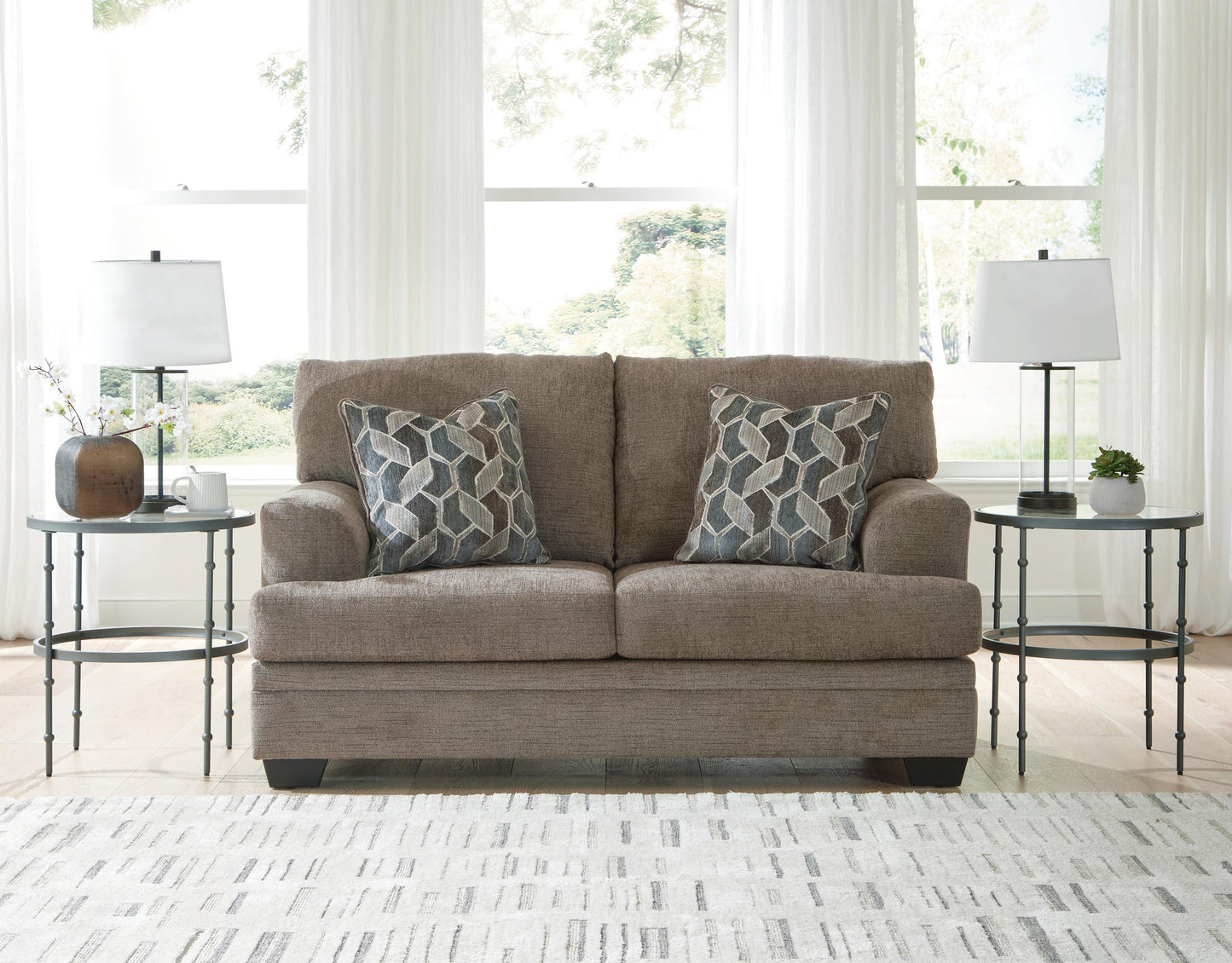 Stonemeade Sofa, Loveseat, Chair and Ottoman