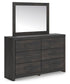 Delmorta Full Panel Bed with Storage, Dresser, Mirror and Nightstand